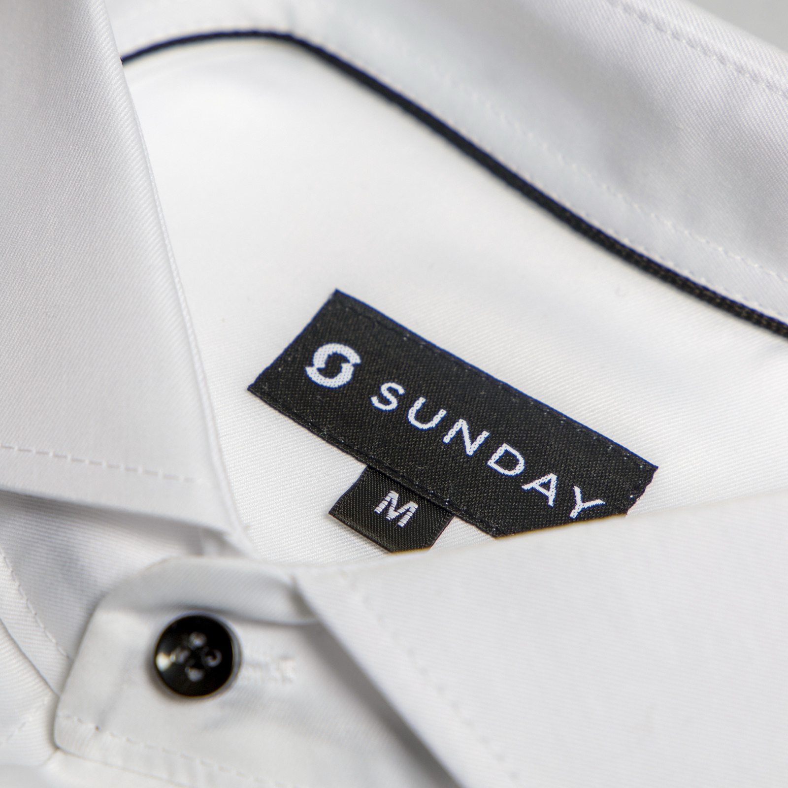 A Sunday-branded business shirt, the coordinated look that drives lead capture at events