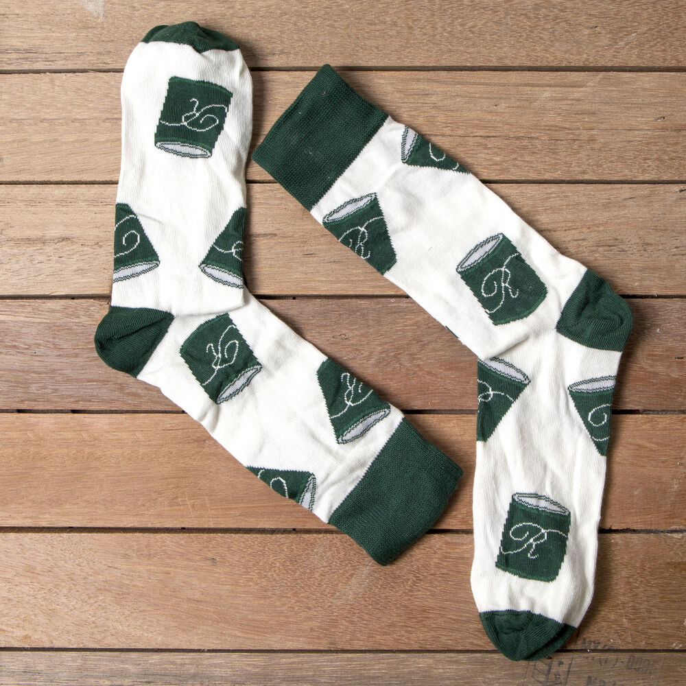 A pair of well-designed custom corporate socks laid flat, the near-universal corporate gift that works across audiences and budgets