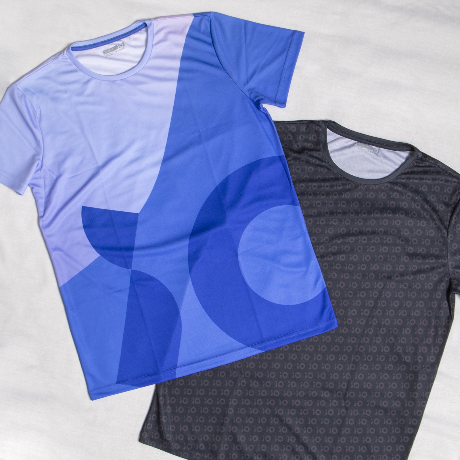 An iO Digital-branded custom sports jersey showing lightweight, performance-friendly decoration