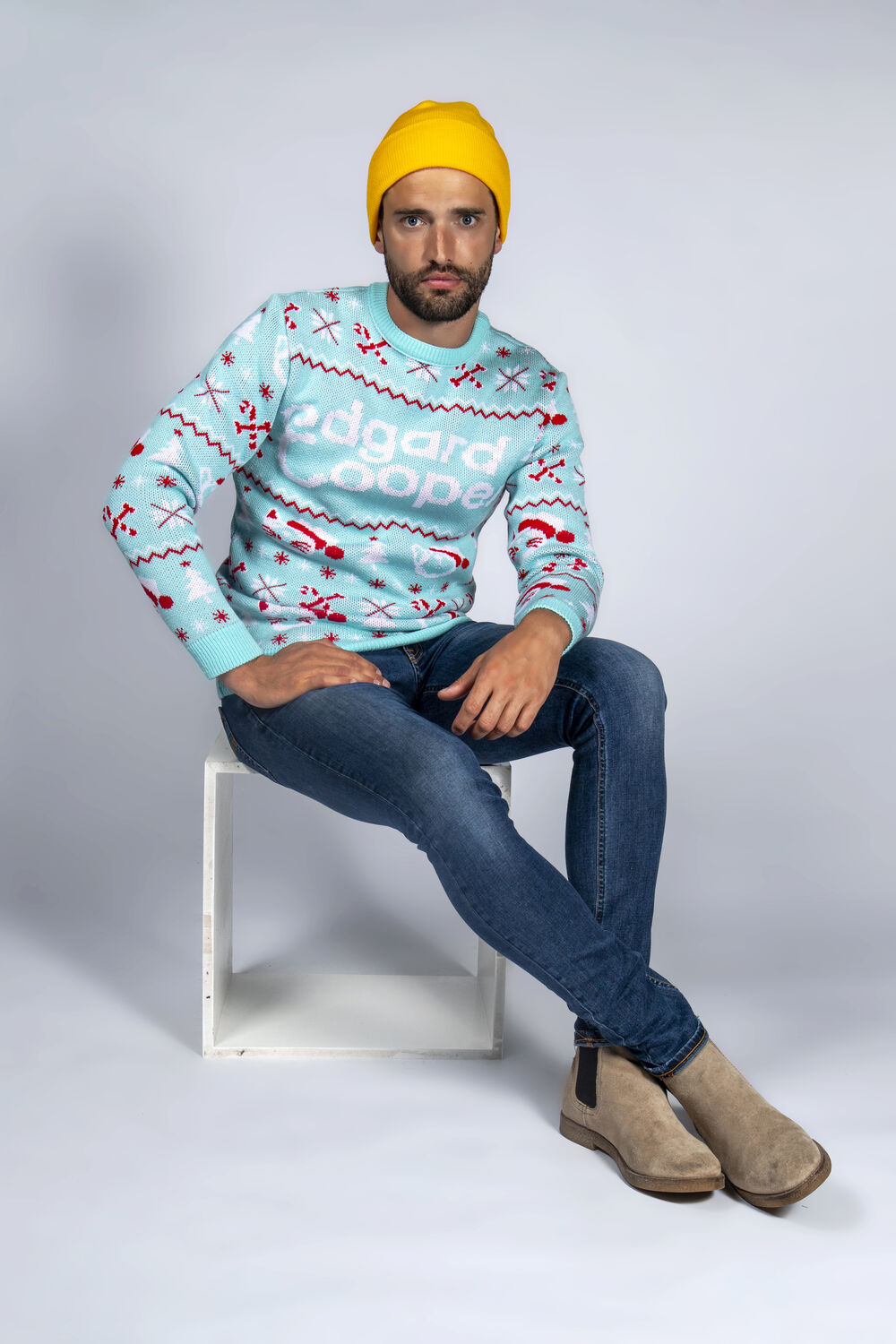 Edgard & Cooper team in branded Christmas sweaters, a real corporate Christmas gift campaign