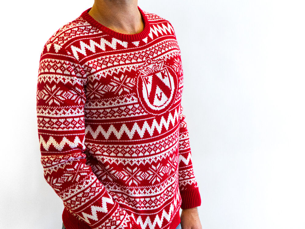 Branded KVK Christmas sweater by Sunday worn by a team, a festive staff gift