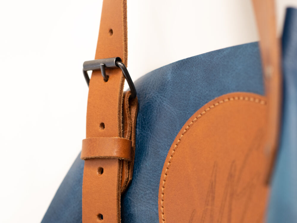 A branded hospitality apron as workwear, made to look well-groomed and to withstand intensive washing