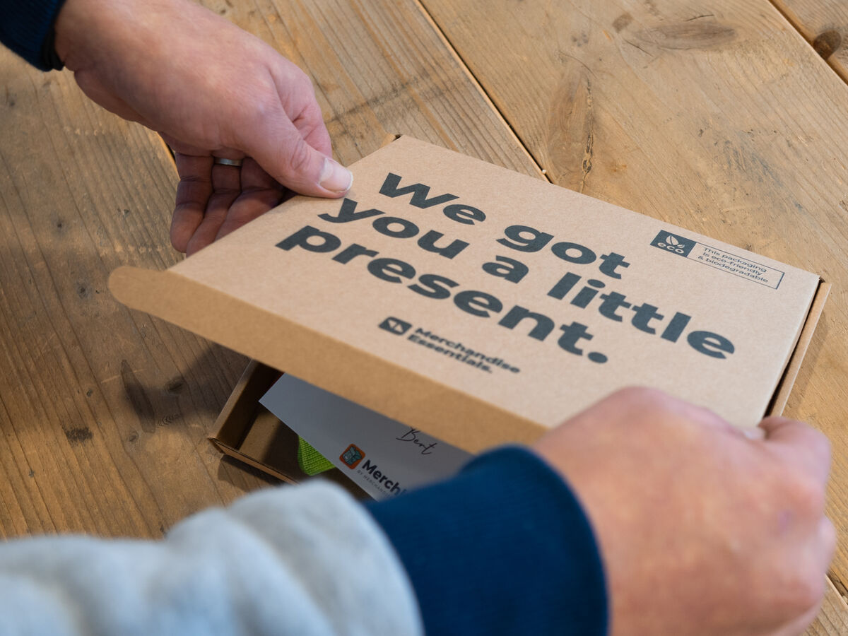 A branded gift box carrying a printed personal message, an example of personalized corporate gifts where the message does the work