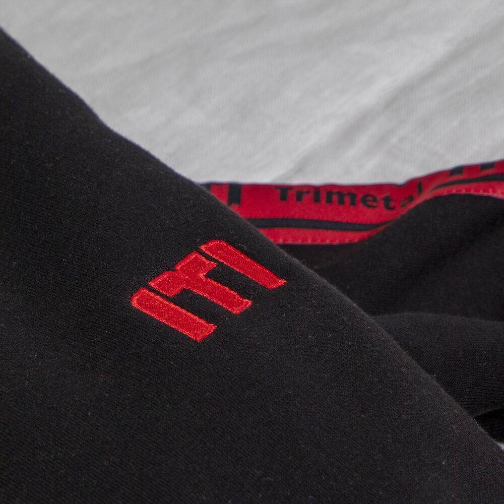 Prenda de ropa laboral personalizada con decoración duradera que resiste el lavado repetido