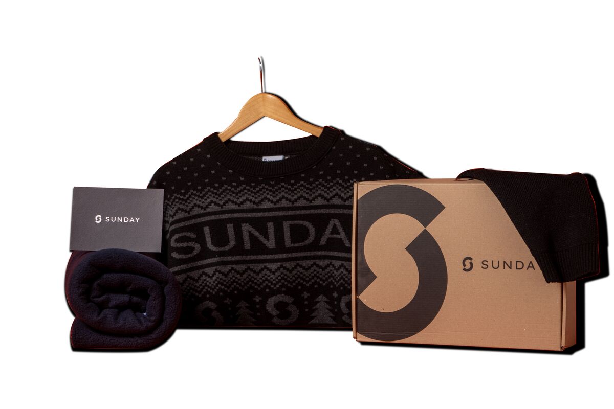 A considered corporate gift set with a branded sweater, blanket and gift box, the kind of unique corporate gift that starts from a concept rather than a catalogue