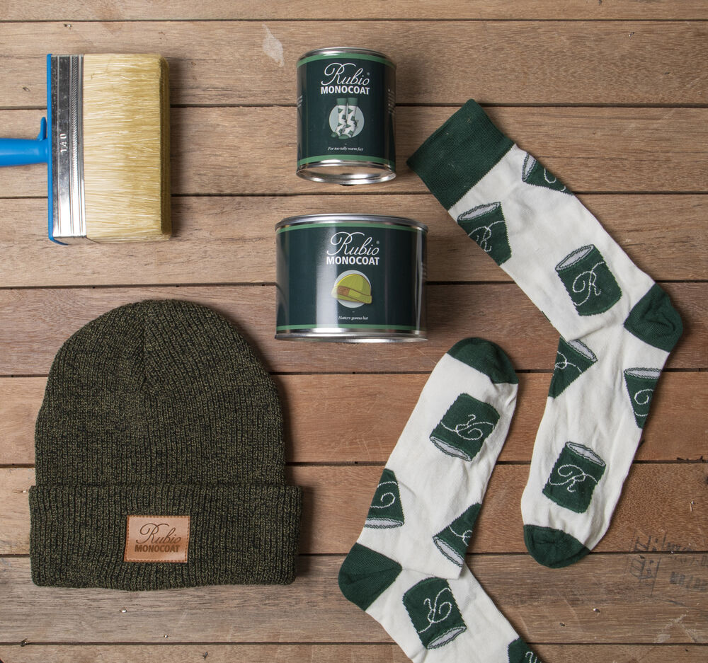 A beanie with a sewn-on patch, a fashion-led decoration that preserves the logo shape