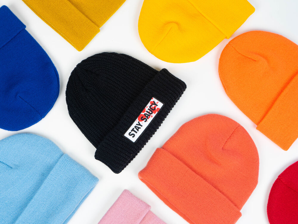 A branded beanie as one option within a broader partner gifting programme