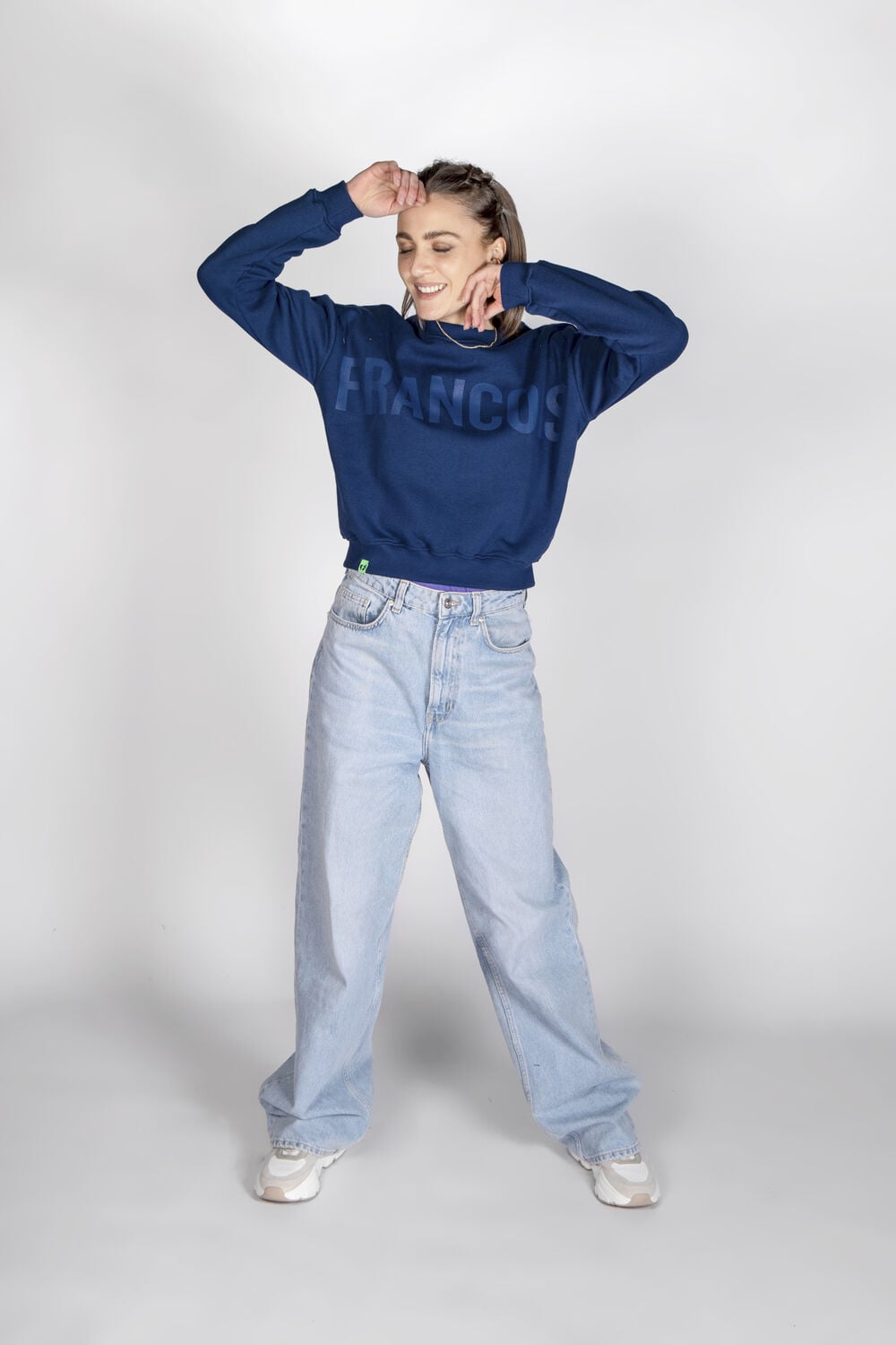 Bedrijfskleding dames: een gebrande sweater in een aparte damespasvorm uit een bedrijfscollectie