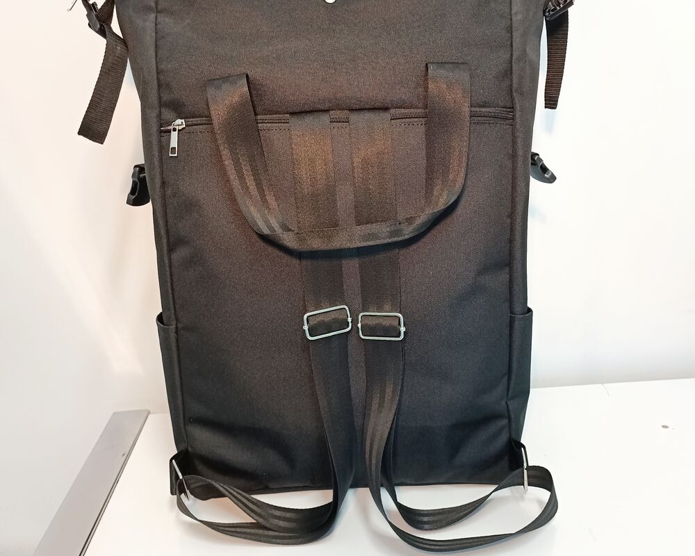 A premium canvas backpack with understated branding, an underused corporate gift that gets carried daily for years